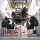 The Mars 2020 rover being lowered onto its wheels.